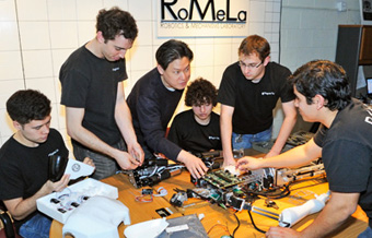 RoMeLa Director Dennis Hong (center)