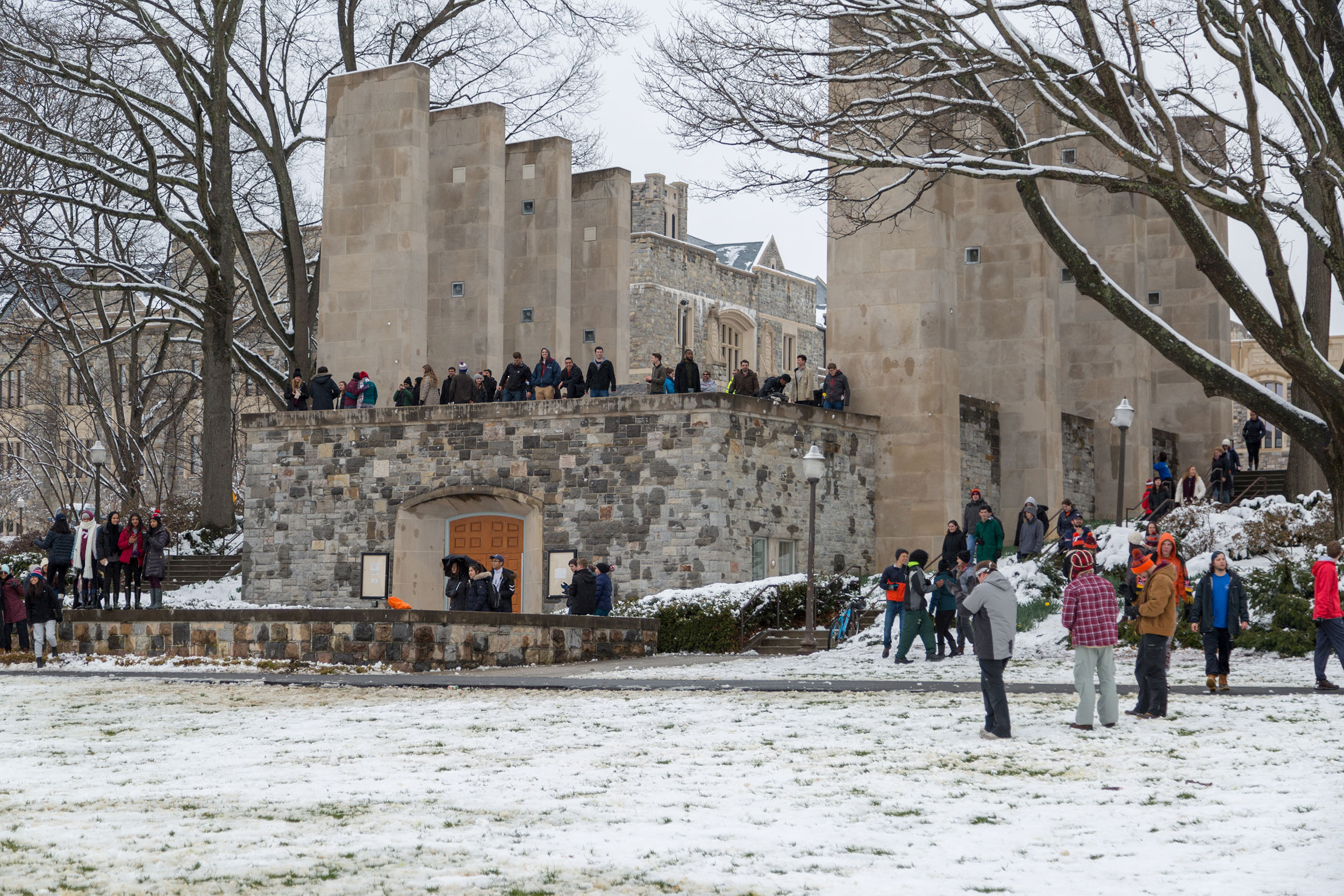 Students gather at the Pylons on a snow day in March.