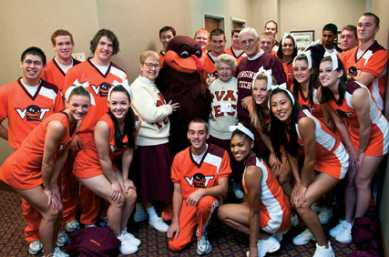 Virginia Tech cheerleaders, past and present, with the HokieBird
