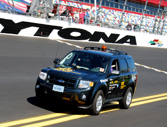 Leaving the famed starting line behind, Mark Riccobono traversed the Daytona International Speedway. His trek totaled 1.5 miles and took less than 10 minutes to finish. Riccobono is executive director of the National Federation of the Blind's Jernigan Institute.