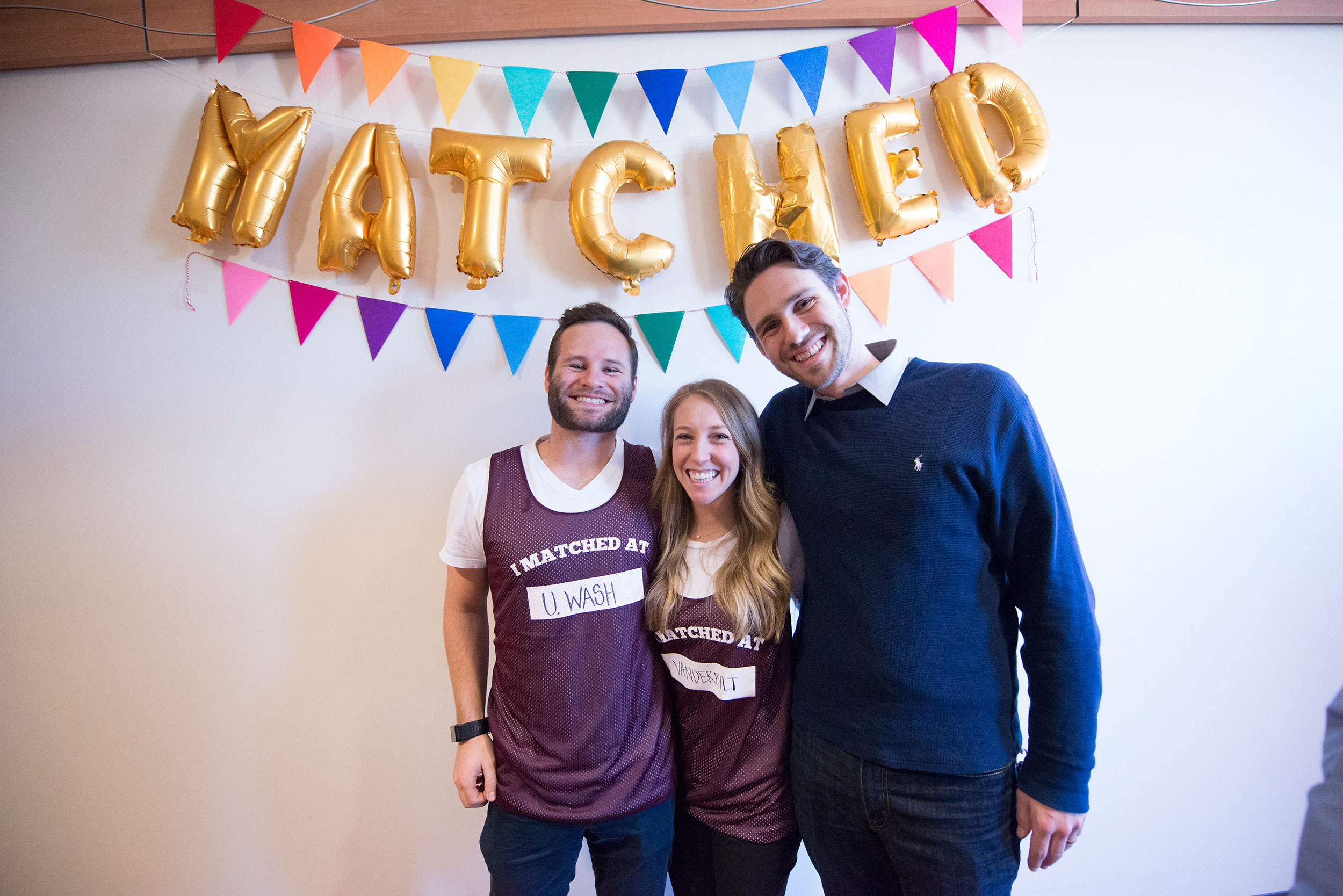 Medical school students Zakk Walterscheid (’18) and Lia Manfredi (’18) celebrate with friends and family on Match Day.