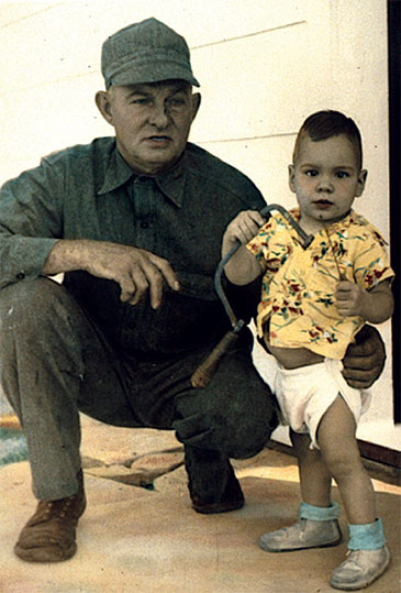 Toddler Brent Opell with his grandfather